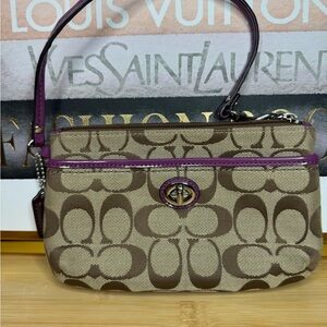 Coach Signature Canvas Turnlock Wristlet in Brown with Purple Trim